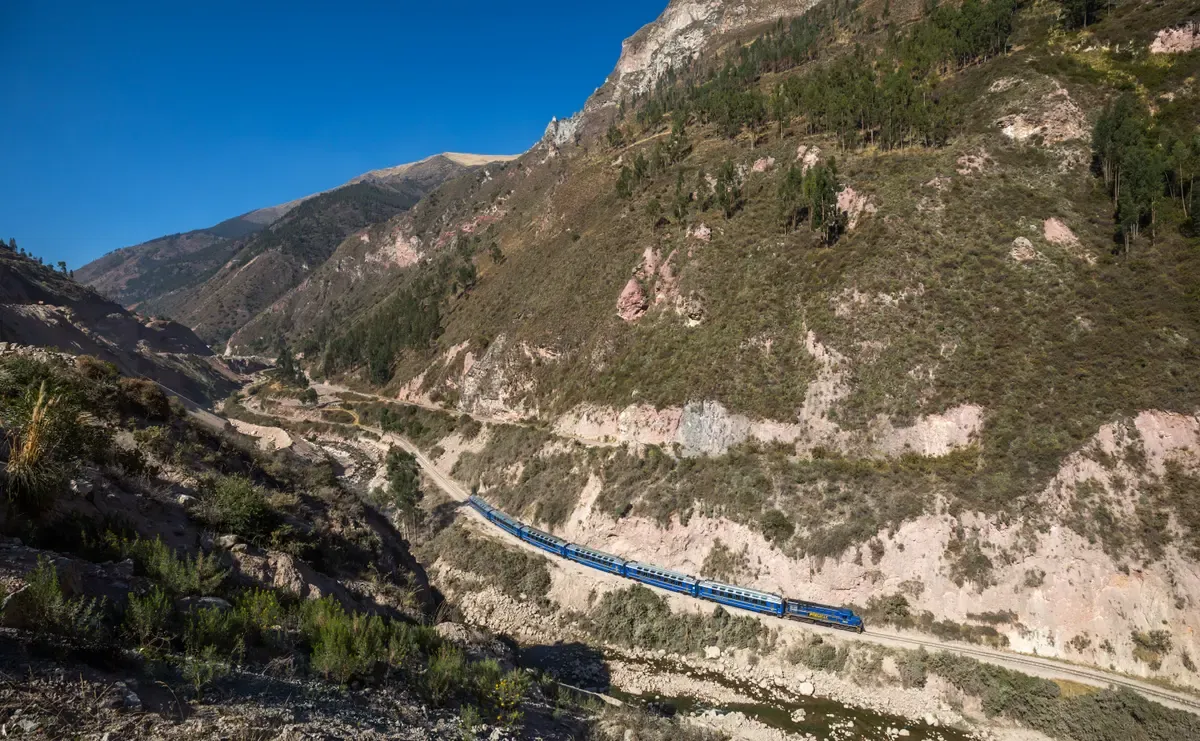 A PeruRail Vistadome train in the valley between Poroy and Ollantaytambo, seen on an Inca Trail tour
